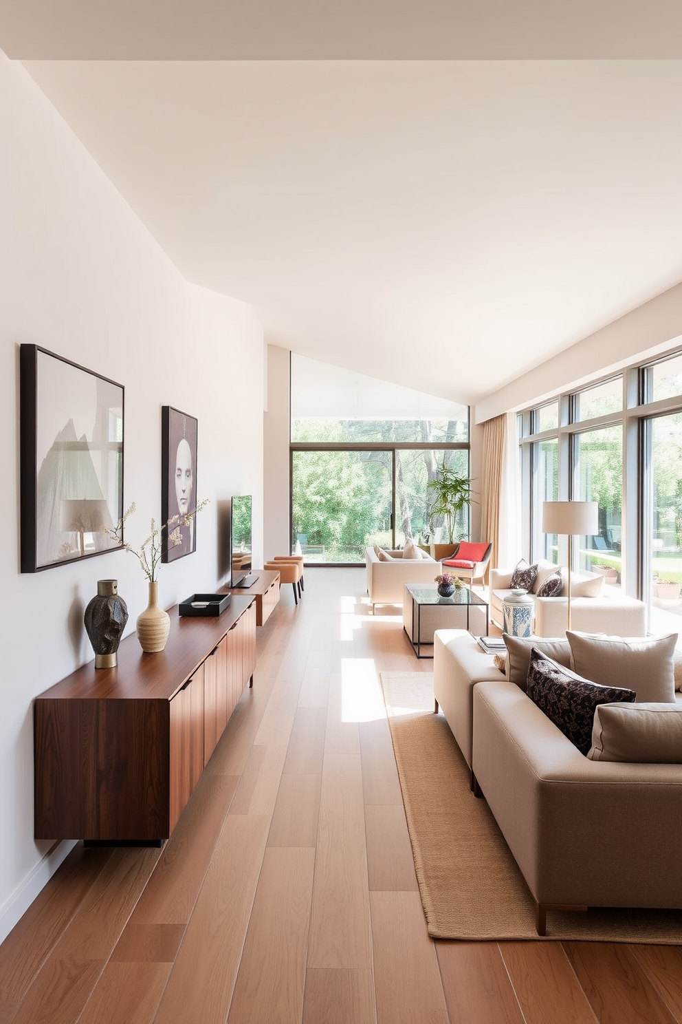 A narrow sideboard is positioned against the wall, providing ample storage while maintaining a sleek profile. The living room features a long, inviting layout with a cozy seating arrangement that encourages conversation and relaxation. The walls are adorned with soft neutral tones, creating a warm and welcoming atmosphere. Large windows allow natural light to flood the space, enhancing the overall brightness and openness of the room.